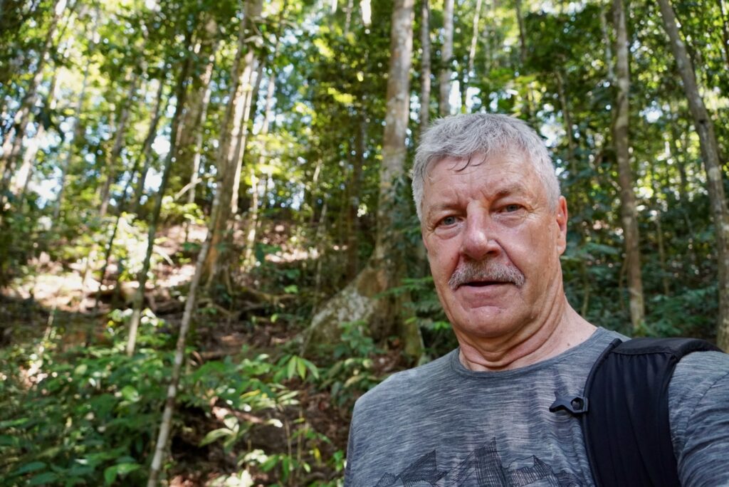 Larry trekking in Bukit Lawang