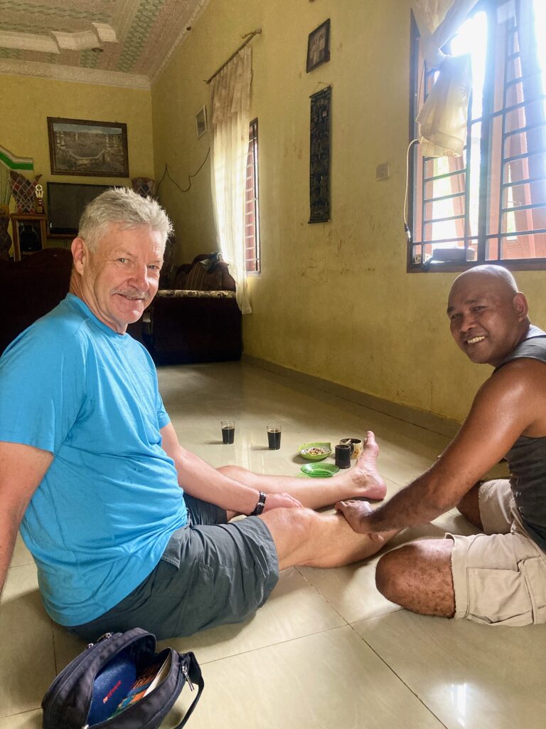 Muklis, local traditional massage working on me.